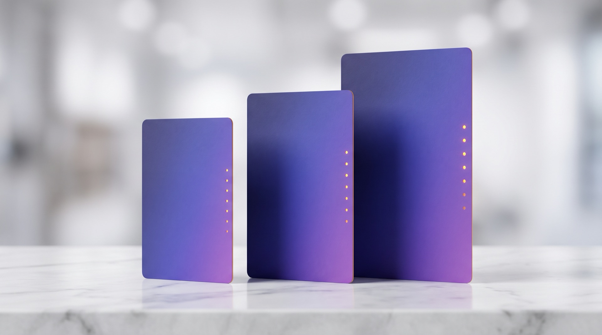 Pricing tier cards on a white marble surface